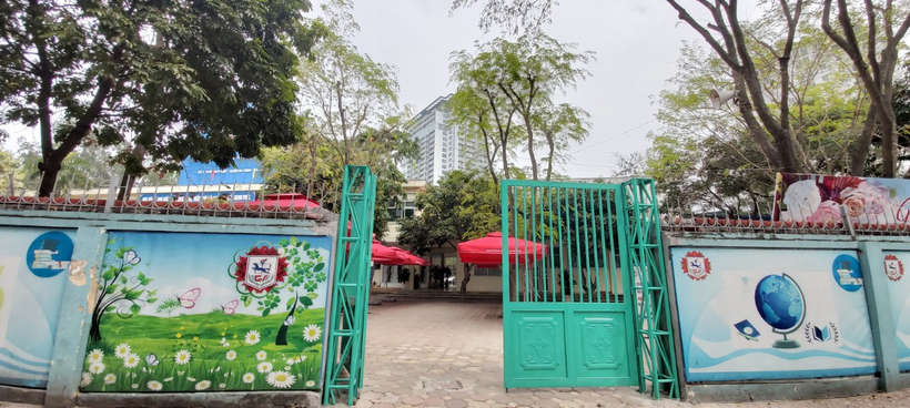 A picture containing text, tree, outdoor, parkDescription automatically generated